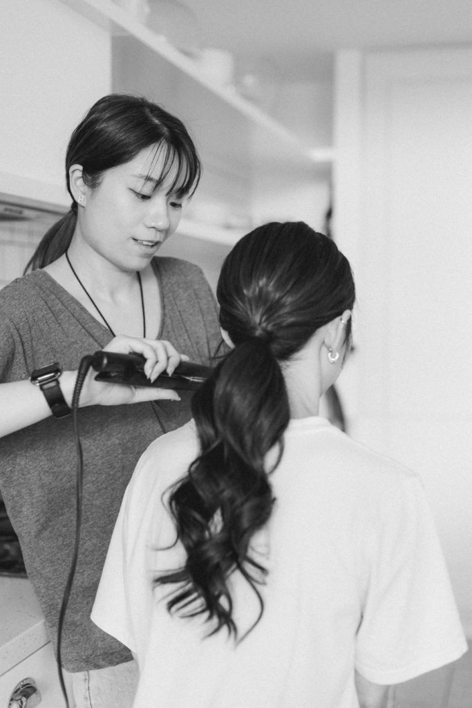 Make-up and Hair Artist Mariane Shao working behind the scene